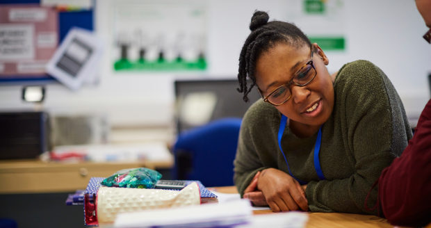 A Sunderland Collede student studying accounting in a classroom.