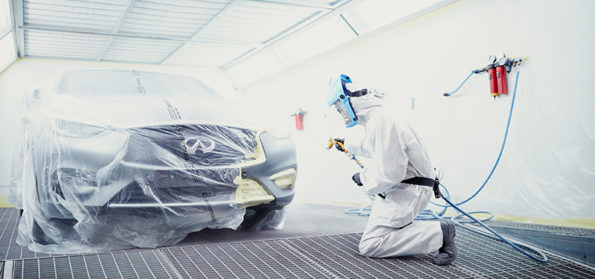 A student at Sunderland College spraying down a motor vehicle