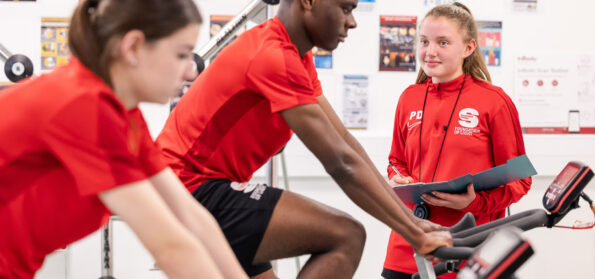 Some sports studies students performing a practical in the state of the art facilities at bede campus.